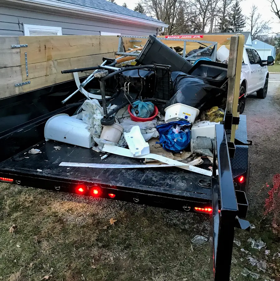 Roll-off dumpster delivered to a residential driveway in Ione